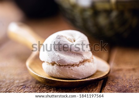 homemade biscuit typical of Brazil, sigh, called merengue. made with beaten whites and sugar. Fast food