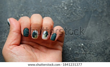 nails with pumpkins. trendy nails design. top view. place for text. flat lay pictures