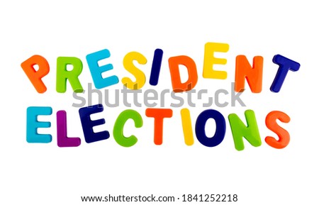 Text PRESIDENT ELECTIONS written in plastic letters on a white background. Concept for the electoral campaign.