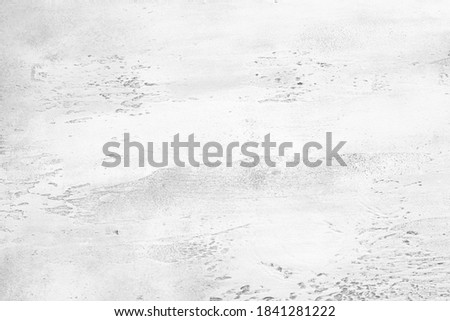 Light gray textured background with light base darker in the recesses. Abstract texture for graphic design or wallpaper, top view