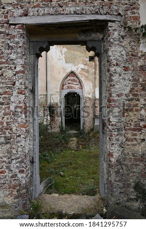 Lost place, Abandoned ancient church ruin Royalty-Free Stock Photo #1841295757