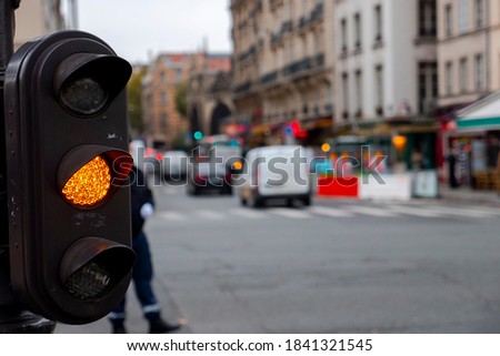 Detail shot of small black traffic light in Paris Royalty-Free Stock Photo #1841321545