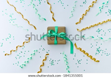 Banner with carnival party serpentine decoration. Colorful streamer isolated on white background. Flat lay
