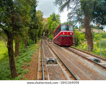 red funicular climbing up the hill in orvieto italy Royalty-Free Stock Photo #1841369098