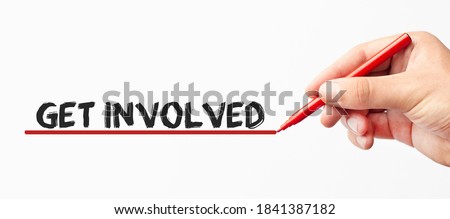Hand writing GET INVOLVED with red marker. Isolated on white background. Business, technology, internet concept. Stock Image