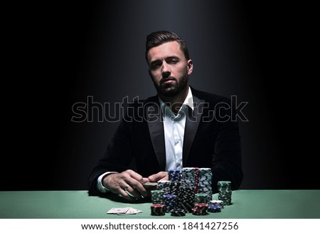 Portrait of a professional poker player Royalty-Free Stock Photo #1841427256