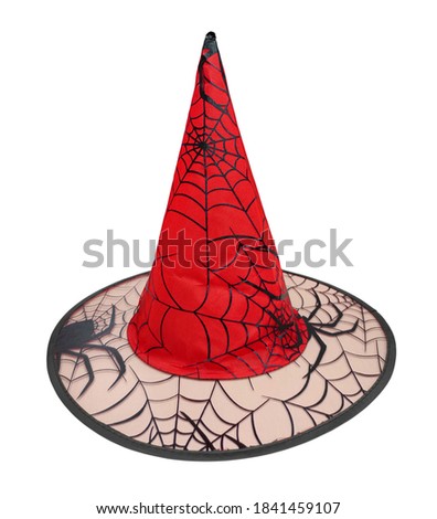 Halloween red cone hat with black spiderweb isolated on white background.