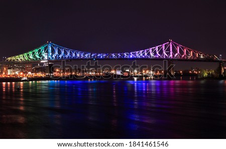 Jacques Cartier Bridge illuminated at night in Montreal, Canada
