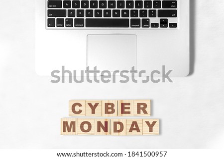 Cyber Monday text on the wooden cube on the desk. Cyber Monday concept