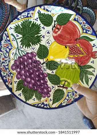 handmade dish with a picture of fruit