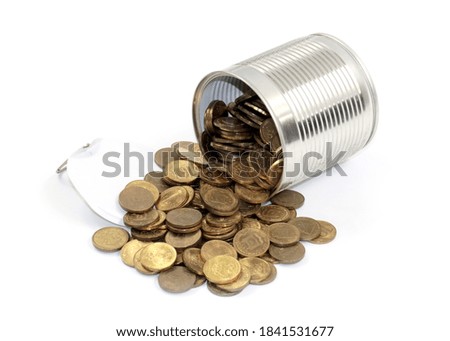 metal coins russian ruble lie in an open tin can