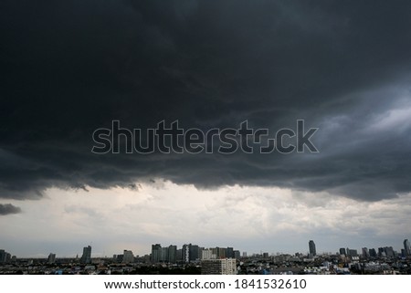 Pictures of heavy rain and stormy clouds In the modern city