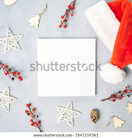 Mockup poster frame and Christmas decoration. Blank canvas board for Christmas design. Top view.