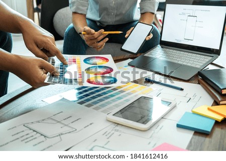 Professional Creative Team of Web/Graphic Designer planning, drawing website ux app for mobile phone application and development template layout, process to prototype wireframe, User experience.