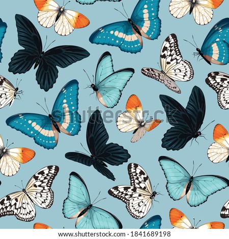 Seamless pattern with blue and yellow butterflies