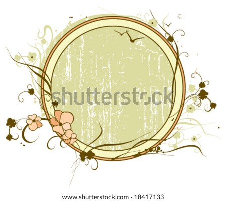 Round frame with silhouettes of flowers & grass.