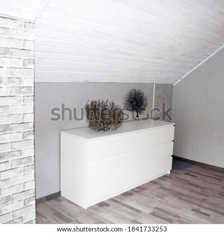 attic interior in white and gray tones close-up
