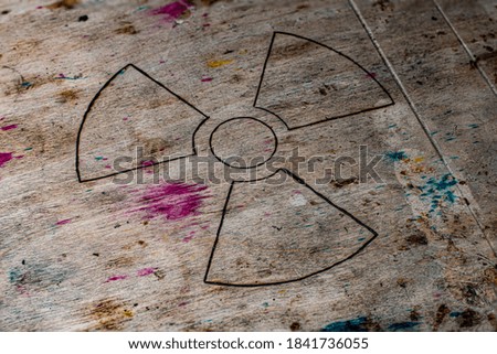 Radioactive symbol on wooden desk