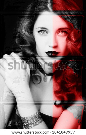 Pretty female fashion model posing in studio with dark gothic make up