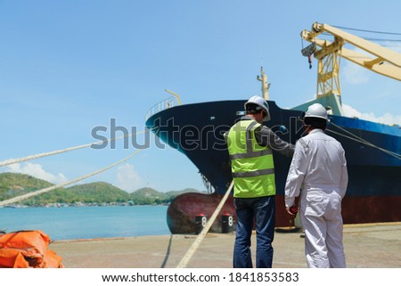 Workers standing and planning for workers in Shipyard Ship repair 