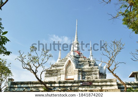church in Phra Buddha Chai ancient Buddhist temple with sign  Phrabuddhabath meaning Buddha footprint for respect in Thailand 