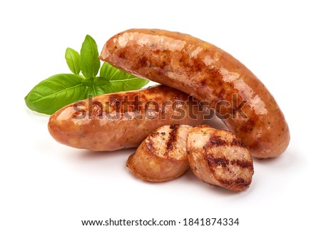 Grilled bavarian sausages, isolated on white background. Royalty-Free Stock Photo #1841874334
