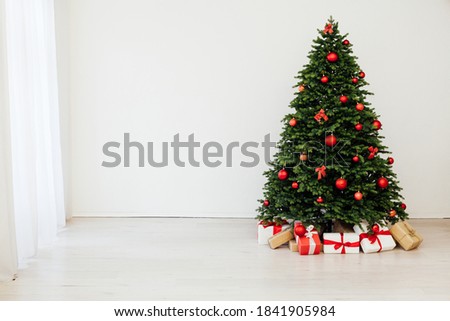 Christmas tree with gift decor for the New Year 2022 holiday winter place for inscription