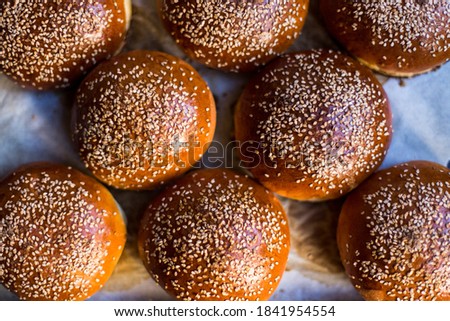 close up of burger buns with sesame seeds