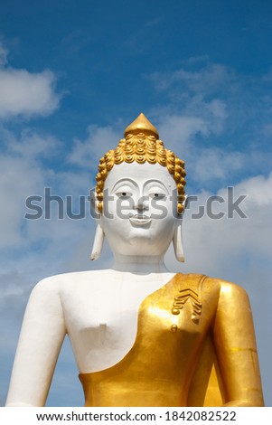 Big buddha in Wat Phra That Doi Kham (Temple of the Golden Mountain)
