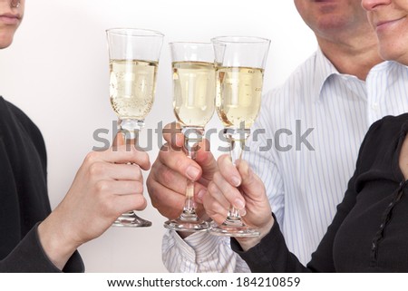 People celebrating with champagne your success