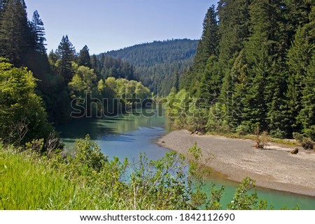 The eel River winds through Humboldt Redwoods State Park in northern California Royalty-Free Stock Photo #1842112690