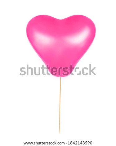 pink heart-shaped balloon isolated on white background