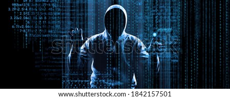 Hacker prints a code on a laptop keyboard to break into a cyberspace Royalty-Free Stock Photo #1842157501