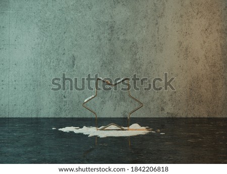 3d rendering of golden star shape covered by snow in front of grunge wall background with reflection floor
