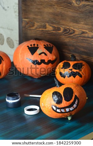 painted funny pumpkins with acrylic paints, celebrate the Halloween holiday at home