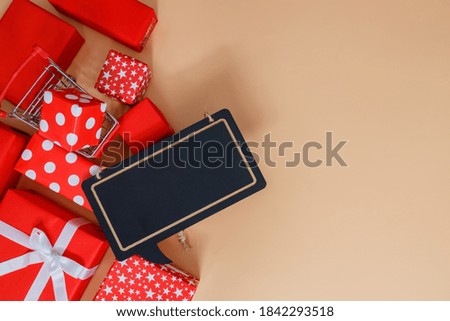 Frame of red gift boxes on yellow background with copy space for text 11.11 single's day sale. Thanksgiving day concepts, Christmas Concepts and New year concepts.