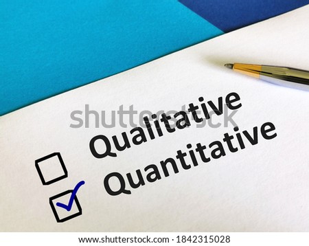 One person is answering question. He is choosing between qualitative and quantitative. Royalty-Free Stock Photo #1842315028
