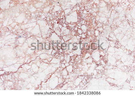 Marble pink stone texture. Light wall background.