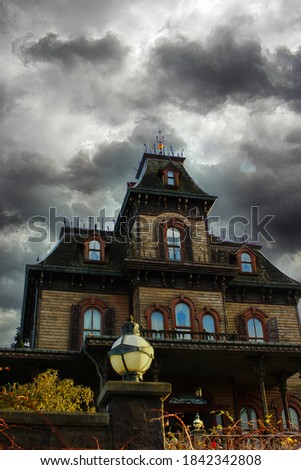 Abandoned house in a dramatic cloudy evening. Horror House