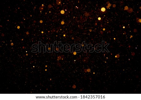 Abstract gold bokeh with black background Royalty-Free Stock Photo #1842357016