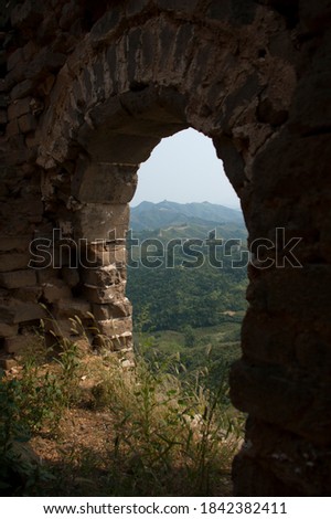 The ruins of the Great Wall at Gu Bei Kou mountain, located in the northern of Beijing. The Great wall were damaged during the world war II. This photo was taken at Sep 18 2008.