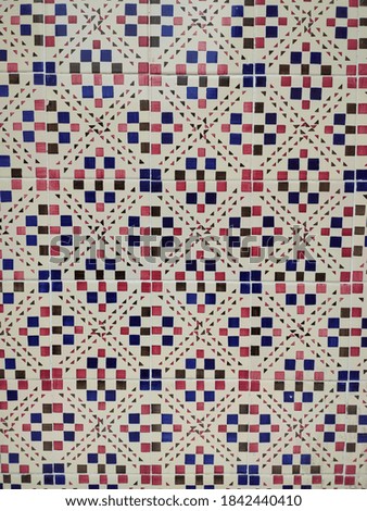 A colorful pattern, blue, red, white