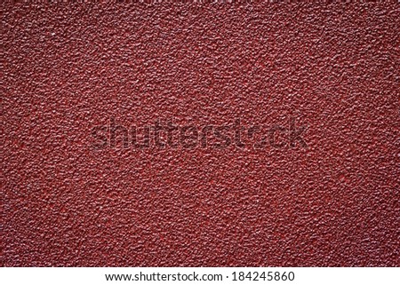 Seamless grainy texture. Red color empty surface background with space for text, sign and luxury style design.
