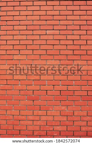 Orange brick wall. Seamless pattern. Textured abstract backgroun