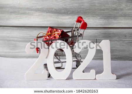 cart with a gift for the new year 2021