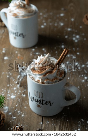 A photo of cappuccino with Christmas decoration 