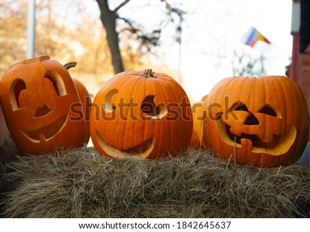 A large bright ripe pumpkin Jack-o-lantern