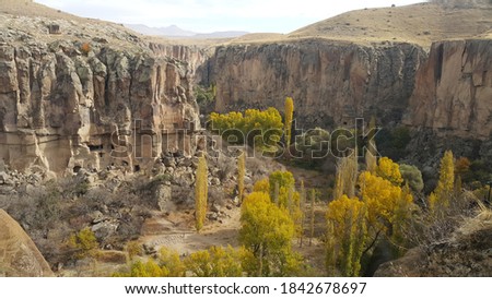 Tourism destination in Turkey with Cappadocia, Nevsehir province, fairy chimneys and natural rocks
