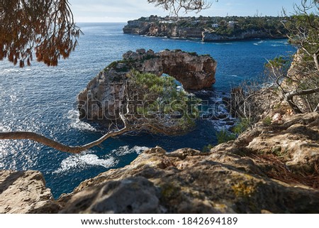 Es Pontas, a natural bridge rock on Mallorcas south coast and diving site. Royalty-Free Stock Photo #1842694189