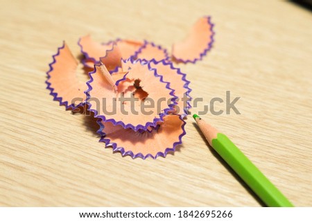 Modern background. Colored pencil shavings